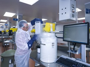 In this July 9, 2015, photo, provided by Novartis Pharmaceuticals Corp., human T cells belonging to cancer patients arrive at Novartis Pharmaceuticals Corp.'s Morris Plains, N.J., facility. This laboratory is where the T cells of cancer patients are processed and turned into super cells as part of a new gene therapy-based cancer treatment Novartis is a part of. (Brent Stirton/Courtesy of Novartis Pharmaceuticals Corp. via AP)