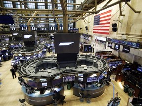 FILE - This Thursday, Feb. 9, 2017, file photo, shows the floor of the New York Stock Exchange. Exchange-traded funds have swept the stock market over the past decade and been a blessing for many investors. But while large index-based funds, such as those that track the Standard & Poor's 500, may fairly represent the index's stocks, smaller niche ETFs don't always deliver strictly what their names promise, and you might wind up indirectly buying a lot of something you didn't really want. (AP Photo/Mark Lennihan, File)