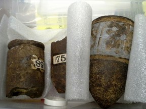 This photo provided by the Carlisle Police Department shows Civil War-era artillery shells that were discovered by a librarian at the Gleason Public Library in Carlisle, Mass., on Thursday, July 20, 2017. (Carlisle Police Department via AP)