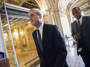 FILE - In this June 21, 2017 file photo, special counsel Robert Mueller departs after a closed-door meeting with members of the Senate Judiciary Committee about Russian meddling in the election and possible connection to the Trump campaign, at the Capitol in Washington. President Donald Trump's legal team is evaluating potential conflicts of interest among members of Mueller's investigative team, according to three people with knowledge of the matter. The revelations come as Mueller's probe into Russia's election meddling appears likely to include some of the Trump family's business ties. (AP Photo/J. Scott Applewhite, File)