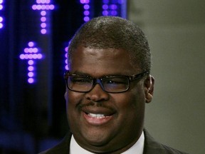 FILE - In this April 11, 2011 file photo, Charles Payne, of the Fox Business Network, appears on "Varney & Co.," in New York. Payne has been suspended after reportedly being accused of sexual harassment. The network said Thursday, July 6, 2017, it suspended "Making Money" anchor Payne pending an investigation, but didn't provide any details. (AP Photo/Richard Drew, File)