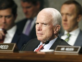 FILE - In this July 11, 2017 file photo, Senate Armed Services Committee Chairman Sen. John McCain, R-Ariz. listens on Capitol Hill in Washington, during the committee's confirmation hearing for Nay Secretary nominee Richard Spencer. Surgeons in Phoenix said they removed a blood clot from above the left eye of McCain. Mayo Clinic Hospital doctors said Saturday, July 15 that McCain underwent a "minimally invasive" procedure to remove the nearly 2-inch (5-centimeter) clot, and that the surgery went "very well." They said the 80-year-old Republican is resting comfortably at his home in Arizona. Pathology reports are expected in the next several days.  (AP Photo/Jacquelyn Martin, File)