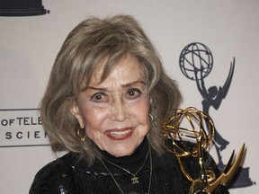 FILE - In this Sept. 15, 2013 file phtoo, June Foray poses backstage with the Governor's Award at the Primetime Creative Arts Emmy Awards at the then Nokia Theatre L.A. Live, in Los Angeles.  Foray's niece, Robin Thaler, said Thursday, July 27, 2017, that Foray died at Wednesday in a Los Angeles hospital of cardiac arrest. She was 99. (Photo by Richard Shotwell/Invision/AP, File)