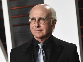 FILE - In this Feb. 28, 2016, file photo, Larry David arrives at the Vanity Fair Oscar Party in Beverly Hills, Calif. HBO has locked down October 1 to start a new season of the Larry David comedy "Curb Your Enthusiasm." HBO said Monday that the 10 episodes will bring back regulars Jeff Garlin, Susie Essman and JB Smoove, among others. (Photo by Evan Agostini/Invision/AP, File)