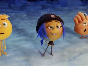 This image released by Sony Pictures shows characters, from left, Gene, voiced by T.J. Miller, Jailbreak, voiced by Anna Faris and Hi-5, voiced by James Corden in Columbia Pictures and Sony Pictures Animation's "The Emoji Movie." (Sony Pictures Animation via AP)