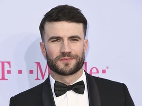FILE - In this May 21, 2017 file photo, Sam Hunt arrives at the Billboard Music Awards in Las Vegas. Hunt has beaten out Florida Georgia Line for a record number of weeks atop Billboard's Hot Country Songs chart with his single "Body Like a Back Road." (Photo by Richard Shotwell/Invision/AP, File)