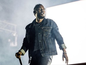 FILE - In this July 7, 2017 file photo, Kendrick Lamar performs during the Festival d'ete de Quebec in Quebec City, Canada. Lamar is the leader of the MTV Video Music Awards with eight nominations. The 2017 VMAs will air live Aug. 27 from the Forum in Inglewood, Calif. (Photo by Amy Harris/Invision/AP, File)