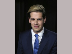 Media personality and author Milo Yiannopoulos appears during an interview in New York on Tuesday, July 18, 2017, to promote his autobiography, "Dangerous." (AP Photo/John Carucci)
