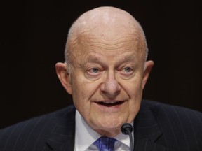 FILE - This May 8, 2017 file photo shows former National Intelligence Director James Clapper testifying on Capitol Hill in Washington. Clapper, a former top intelligence official who has clashed with President Donald Trump, has a book deal. Viking said that Clapper will write about his years as Director of National Intelligence during President Obama's administration and his long career in military and government service. The book is currently untitled and scheduled for next year. (AP Photo/Pablo Martinez Monsivais, File)