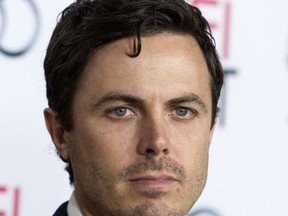 FILE - In this Nov. 9, 2013 file photo, actor Casey Affleck arrives at the 2013 AFI Fest premiere of "Out of the Furnace" in Los Angeles. Affleck plays the ghost in the new David Lowery film, "A Ghost Story." For most of the movie he's silent and cloaked in a white sheet with eye holes as he returns to his home to look in on his still-living partner played by Rooney Mara.  (Photo by Paul A. Hebert/Invision/AP, File)