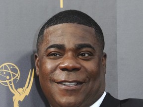 FILE - In this Sept. 10, 2016 file photo, Tracy Morgan arrives at the Creative Arts Emmy Awards in Los Angeles. Morgan said he's a better man since the 2014 roadway accident that left him critically injured and killed his friend, comedian James McNair. His remarks were made during a Q&A session to promote his new TBS comedy series, "The Last O.G." where he plays an ex-con who finds the life and New York neighborhood he left behind is gone. (Photo by Richard Shotwell/Invision/AP, File)