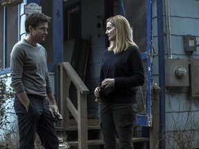 This image released by Netflix shows Laura Linney, right, and Jason Bateman in a scene from the series, "Ozark." (Jackson Davis/Netflix via AP)