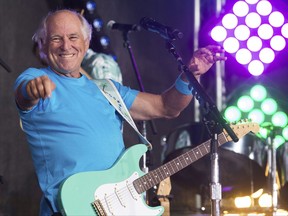 FILE - In this July 29, 2016, file photo, Jimmy Buffett performs on NBC's "Today" show in New York. Buffett's childhood home of Alabama on Thursday, July 13, 2017,  backed off a short-lived ban on the sale of pitchers of the tequila-based drink he made famous. The Alabama Alcoholic Beverage Control Board announced an end to the pitcher prohibition a day after al.com published a column criticizing the moratorium. (Photo by Charles Sykes/Invision/AP, File)