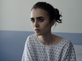 This image released by Netflix shows Lily Collins in, "To The Bone." (Netflix via AP)