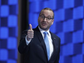 FILE - In this July 28, 2016, file photo, Chad Griffin, president of the Human Rights Campaign gives a thumbs-up after speaking during the final day of the Democratic National Convention in Philadelphia. HRC, one of the nation's leading gay rights groups, is launching a $26 million political organizing effort ahead of 2018 midterm elections.  (AP Photo/Paul Sancya, File)