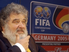FILE - In this Feb. 14, 2005 file photo, Confederation of North, Central American and Caribbean Association Football (CONCACAF) general secretary Chuck Blazer attends a press conference in Frankfurt, Germany. Blazer, the disgraced American soccer executive whose admissions of corruption set off a global scandal that ultimately toppled FIFA President Sepp Blatter, has died. He was 72. Blazer's death was announced Wednesday, July 12, 2017, by his lawyers, Eric Corngold and Mary Mulligan. (AP Photo/Bernd Kammerer, File)