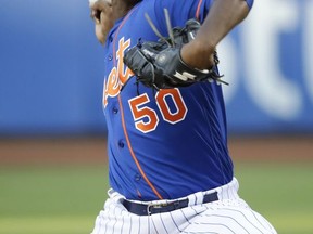 New York Mets' Rafael Montero winds up during the first inning of the team's baseball game against the St. Louis Cardinals Tuesday, July 18, 2017, in New York. (AP Photo/Frank Franklin II)