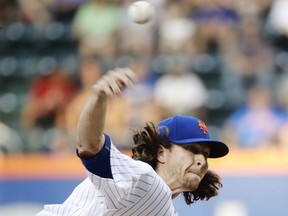 New York Mets' Jacob deGrom delivers a pitch during the first inning of the team's baseball game against the St. Louis Cardinals on Wednesday, July 19, 2017, in New York. (AP Photo/Frank Franklin II)