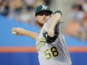 Oakland Athletics' Paul Blackburn delivers a pitch during the first inning of an interleague baseball game against the New York Mets, Friday, July 21, 2017, in New York. (AP Photo/Frank Franklin II)