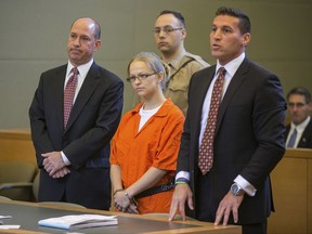 FILE - In this May 29, 2015 file photo, Angelika Graswald, center, stands in court with her attorneys Jeffrey Chartier, left, and Richard Portale at her arraignment in Goshen, N.Y. Graswald, accused of removing a drain plug from her fiance Vincent Viafore's kayak and contributing to his drowning on New York's Hudson river, pleaded guilty on Monday, July 24, 2017 to to criminally negligent homicide. (Allyse Pulliam/Times Herald-Record via AP, Pool, File)