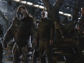 FILE - This file image released by Twentieth Century Fox shows Woody Harrelson, center, in a scene from, "War for the Planet of the Apes." "War for the Planet of the Apes" took down "Spider-Man: Homecoming" at the North American box office, opening with an estimated $56.5 million in ticket sales, according to information available Sunday, July 16, 2017. (Twentieth Century Fox via AP, File)