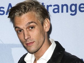 FILE - In this Nov. 9, 2015, file photo, singer Aaron Carter arrives at a premiere of "Saints & Strangers" at the Saban Theater in Beverly Hills, Calif. Authorities said Carter and his girlfriend Madison Parker were arrested Saturday, July 15, 2017, on DUI and drug charges in Georgia. (Photo by Rich Fury/Invision/AP, File)