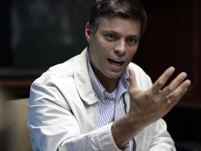 FILE - In this Feb. 26, 2013 file photo, Opposition leader Leopoldo Lopez speaks during a press conference in Caracas, Venezuela. Venezuela's Supreme Court says Lopez has been transferred to house arrest. The court says in a statement early Saturday, July 8, 2017, that Lopez was granted the "humanitarian measure" for health reasons. The 46-year-old Lopez has been behind bars at a military prison for more than three years. (AP Photo/Ariana Cubillos, File)