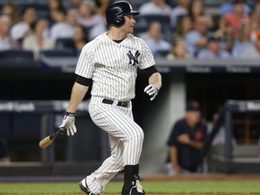 New York Yankees' Chase Headley watches his two-run double during the fourth inning of a baseball game against the Detroit Tigers at Yankee Stadium in New York, Monday, July 31, 2017. (AP Photo/Kathy Willens)