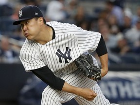 New York Yankees starting pitcher Masahiro Tanaka watches a pitch to the Tampa Bay Rays during the fourth inning of a baseball game, Friday, July 28, 2017, in New York. (AP Photo/Julie Jacobson)