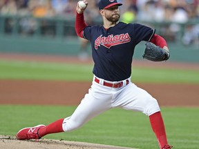 Cleveland Indians starting pitcher Corey Kluber delivers in the first inning of a baseball game against the Detroit Tigers, Sunday, July 9, 2017, in Cleveland. (AP Photo/David Dermer)