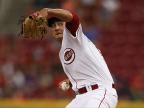Cincinnati Reds starting pitcher Robert Stephenson winds up during the first inning of the team's baseball game against the Miami Marlins, Saturday, July 22, 2017, in Cincinnati. (AP Photo/Gary Landers)