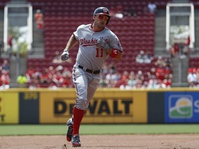 Washington Nationals' Ryan Zimmerman runs the bases after hitting a solo home run off Cincinnati Reds starting pitcher Scott Feldman in the first inning of a baseball game, Monday, July 17, 2017, in Cincinnati. Zimmerman's became the Nationals' career home run leader with 235. (AP Photo/John Minchillo)