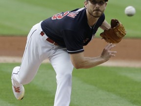Cleveland Indians starting pitcher Josh Tomlin delivers in the first inning of a baseball game against the Cincinnati Reds, Monday, July 24, 2017, in Cleveland. (AP Photo/Tony Dejak)