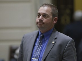 FILE - This Tuesday, May 17, 2016 file photo shows Oklahoma state Sen. Bryce Marlatt, R-Woodward on the Senate floor in Oklahoma City. Authorities say Marlatt, a Republican state senator from Woodward is accused of forcefully grabbing an Uber driver and kissing her on the neck while she drove him to a hotel in Oklahoma City. The Uber driver reported the incident to Oklahoma City police June 28, two days after she alleged it happened. (AP Photo/Sue Ogrocki, File)