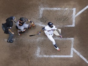 Milwaukee Brewers' Eric Thames hits a home run during the fifth inning of a baseball game against the Baltimore Orioles Tuesday, July 4, 2017, in Milwaukee. (AP Photo/Morry Gash)
