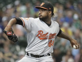 Baltimore Orioles starter Jayson Aquino throws during the first inning of a baseball game against the Milwaukee Brewers Wednesday, July 5, 2017, in Milwaukee. (AP Photo/Morry Gash)
