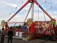 Authorities stand near the Fire Ball amusement ride after the ride malfunctioned injuring several at the Ohio State Fair, Wednesday, July 26, 2017, in Columbus, Ohio.