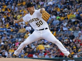 Pittsburgh Pirates starting pitcher Jameson Taillon delivers in the first inning of a baseball game against the St. Louis Cardinals in Pittsburgh, Saturday, July 15, 2017. (AP Photo/Gene J. Puskar)
