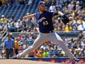 Milwaukee Brewers starting pitcher Jimmy Nelson delivers in the first inning of a baseball game against the Pittsburgh Pirates in Pittsburgh, Thursday, July 20, 2017. (AP Photo/Gene J. Puskar)
