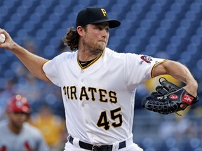 Pittsburgh Pirates starting pitcher Gerrit Cole winds up during the first inning of the team's baseball game against the St. Louis Cardinals in Pittsburgh, Friday, July 14, 2017. (AP Photo/Gene J. Puskar)