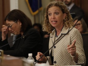 FILE - In this May 24, 2017, file photo, House Budget Committee member Rep. Debbie Wasserman Schultz, D-Fla. questions Budget Director Mick Mulvaney on Capitol Hill in Washington during the committee's hearing on President Donald Trump's fiscal 2018 federal budget. Fellow committee member Rep. Susan DelBene, D-Wash. is at left. Wasserman Schultz fired IT staffer Irman Awan on July 25, 2017, following his arrest on a federal bank fraud charge. (AP Photo/Jacquelyn Martin, File)