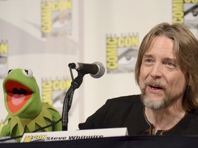 FILE - In this July 11, 2015, file photo, Kermit the Frog, left, and puppeteer Steve Whitmire attend "The Muppets" panel on day 3 of Comic-Con International in San Diego. ABC News and The Hollywood Reporter reported July 10, 2017, that Whitmire is no longer performing the character. (Photo by Tonya Wise/Invision/AP, File)