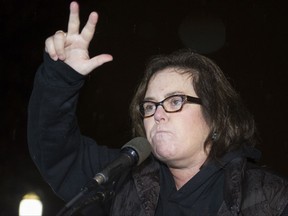 FILE - In this Feb. 28, 2017, file photo, Rosie O'Donnell speaks at a rally calling for resistance to President Donald Trump in Lafayette Park in front of the White House in Washington, prior the president's address to a joint session of Congress. Conservative blogs are criticizing O'Donnell after she tweeted a link to an online game July 15, 2017, where players can lead President Donald Trump off a cliff. (AP Photo/Cliff Owen, File)