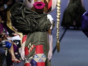 A model wears a creation for Viktor and Rolf's Haute Couture Fall/Winter 2017/2018 fashion collection presented in Paris, Wednesday, July 5, 2017. (AP Photo/Francois Mori)