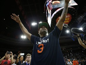 3's Company player coach Allen Iverson acknowledges the hometown fans during his introduction before the start of Game 4 against the Tri State in the BIG3 Basketball basketball League in Philadelphia, Pa., Sunday, July 16, 2017. (AP Photo/Rich Schultz)