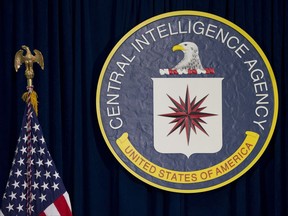 FILE - This April 13, 2016, file photo shows the seal of the Central Intelligence Agency at CIA headquarters in Langley, Va. A hearing in a lawsuit stemming from the agency's harsh interrogation techniques is scheduled for Friday, July 28, 2017 in Spokane, Wash. (AP Photo/Carolyn Kaster, File)
