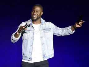 FILE - In this April 13, 2016 file photo, Kevin Hart, addresses the audience during the Universal Pictures presentation at CinemaCon 2016 in Las Vegas. Philadelphia is welcoming back its favorite funnyman, Hart, for a birthday celebration and the unveiling of a giant mural of the comedian near his childhood home. The festivities Thursday morning, July 6, 2017, will include an official resolution dubbing July 6 "Kevin Hart Day" in the city.  (Photo by Chris Pizzello/Invision/AP, File)