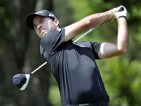 Nick Taylor watches his tee shot on the 12th hole during the final round of the Greenbrier Classic on July 9.