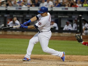 New York Mets' Asdrubal Cabrera (13) connects for a two-run home run against the Philadelphia Phillies during the seventh inning of a baseball game, Saturday, July 1, 2017, in New York. (AP Photo/Julie Jacobson)