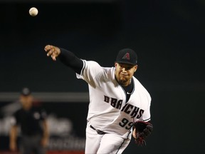 Arizona Diamondbacks' Taijuan Walker throws a pitch against the Atlanta Braves during the first inning of a baseball game Tuesday, July 25, 2017, in Phoenix. (AP Photo/Ross D. Franklin)